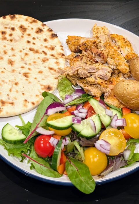 chicken gyros, salad, potatoes and flat bread