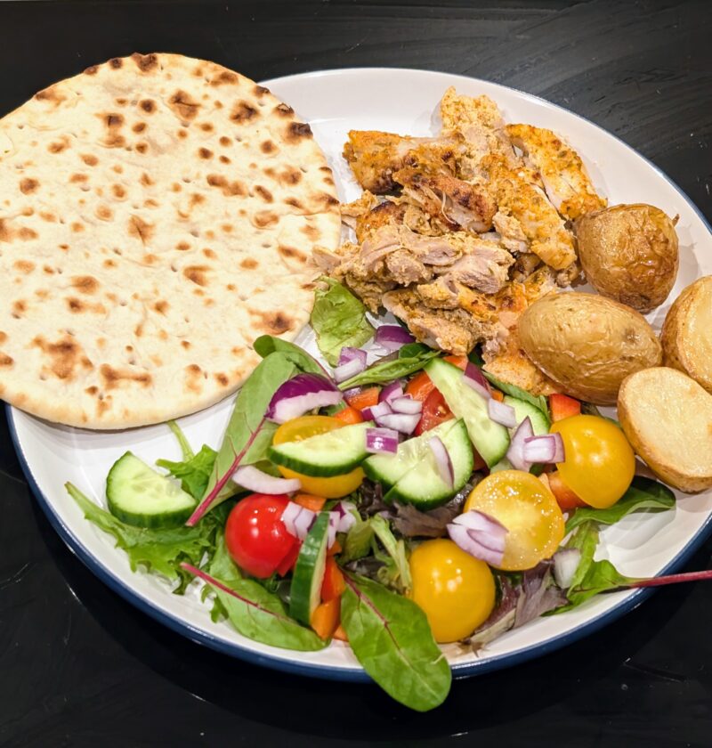 chicken gyros, salad, potatoes and flat bread