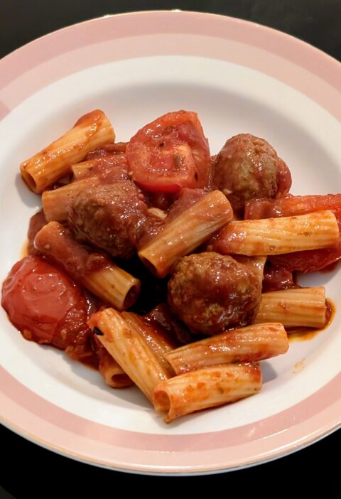 Meatballs and pasta in a bowl