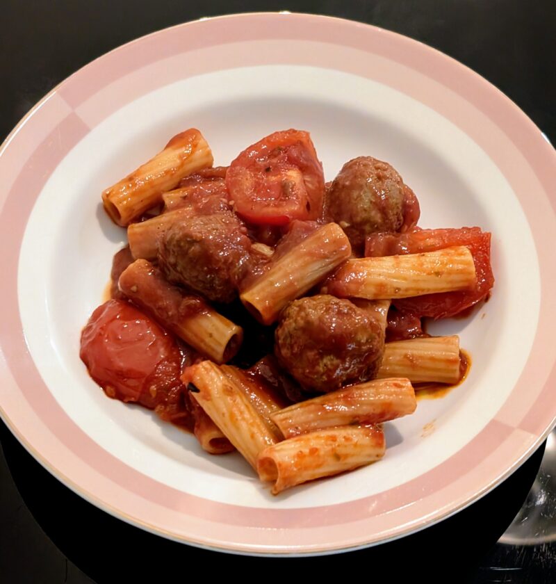 Meatballs and pasta in a bowl